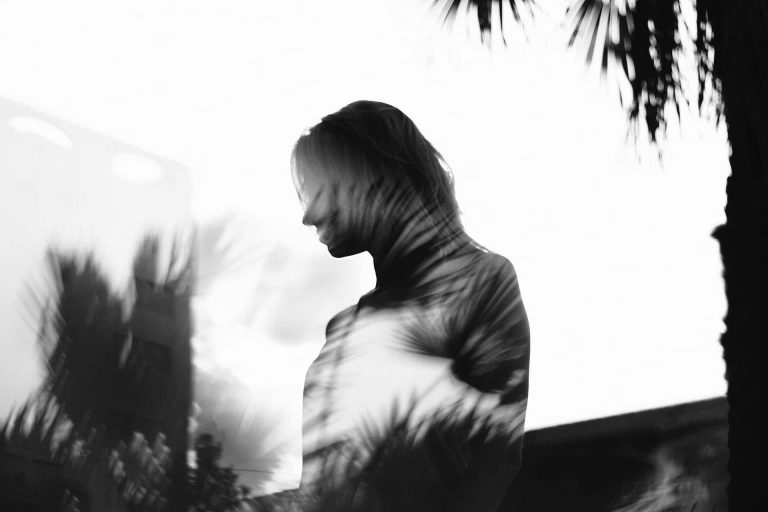 shadowy photo of woman during day